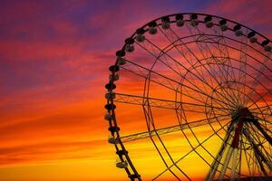 Ferris wheel in a playground in Batumi Square. Amazing and fanfastic sky. photo