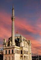 A mosque in istanbul with a bridge in the background photo