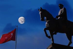 Ataturk statue on the horse with moon. 10 November Ataturk commemoration day concept. photo