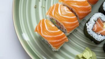 AI generated Neatly Arranged Salmon Sushi Resting on a Light Green Plate, an Exquisite Presentation for a Culinary Symphony. photo