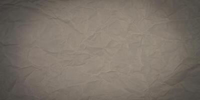 Texture of brown craft crumpled paper. Abstract background. Banner. Place for text. Selective focus. photo