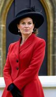 AI generated photo of beautiful lady europe woman with red coat and hat standing at garden, generative AI