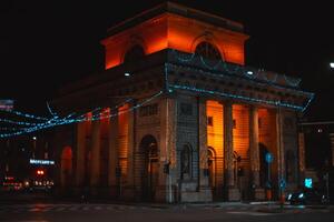 Street of Milan at night. Porta Venezia, Corso Buenos Aires, Milan, Italy 25.12.2023 photo