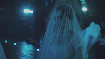 Caucasian female ballet dancer standing behind a stage curtain and waiting backstage to enter the stage for her performance. Graceful ballerina standing behind the scenes and dreaming to perform. video