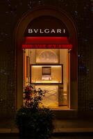 BVLGARI store at via Monte Napoleone street in Milan, Italy. Street in Milan center for fashion and luxury. Christmas holidays in Milan, Italy 2.12.2023 photo