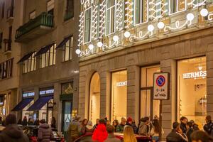 Christmas lights in via Montenapoleone, in the downtown fashion district, in Milan. Christmas vacation in Milan Italy. Christmas store windows in Milan. Italy, Milan 4.12.2023 photo