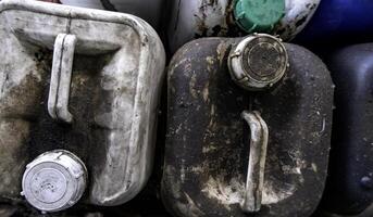 Old dirty oil container photo