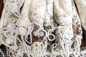 Dried sausages with rope photo