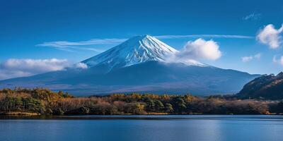 AI generated Mt. Fuji, mount Fuji-san tallest volcano mountain in Tokyo, Japan. Snow capped peak, conical sacred symbol, nature landscape backdrop background wallpaper, travel destination photo