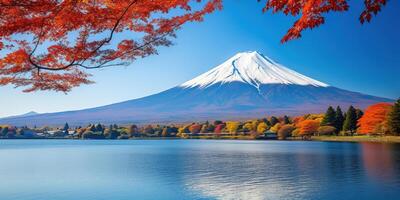 AI generated Mt. Fuji, mount Fuji-san tallest volcano mountain in Tokyo, Japan. Snow capped peak, conical sacred symbol, autumn fall, red trees, nature landscape backdrop background wallpaper, travel photo