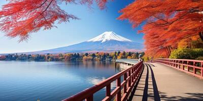 AI generated Mt. Fuji, mount Fuji-san tallest volcano mountain in Tokyo, Japan. Snow capped peak, conical sacred symbol, autumn fall, red trees, nature landscape backdrop background wallpaper, travel photo