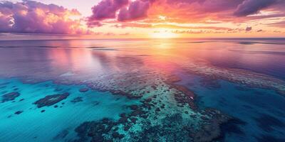 AI generated Great Barrier Reef on the coast of Queensland, Australia seascape. Coral sea marine ecosystem wallpaper background at sunset, with an orange purple sky in the evening golden hour photo