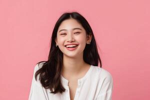 ai generado hermosa joven asiático mujer sonriente animado en pie en rosado aislado estudio antecedentes foto