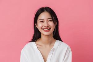 AI generated beautiful young asian woman smiling lively standing in pink isolated studio background photo