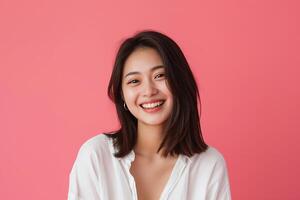 AI generated beautiful young asian woman smiling lively standing in pink isolated studio background photo