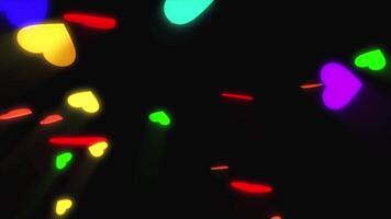 animatie kleurrijk hart vorm Aan zwart achtergrond. video