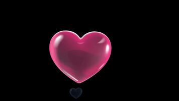 animación corazón forma en negro antecedentes. video