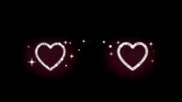 animación corazón forma en negro antecedentes. video