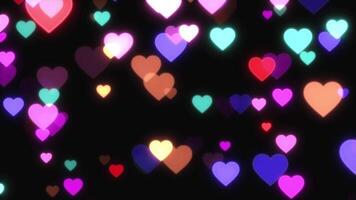 Animation colorful heart shape on black background. video