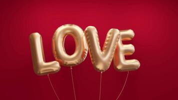 A golden balloon with the word love video