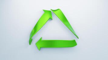 un 3d reciclar símbolo en brillante verde soportes prominentemente en contra un limpiar video