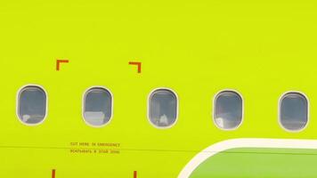 Airplane windows, outside view, close-up. Passenger aircraft, side view video