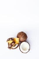 pineapple and coconut on a white background photo