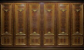 Classic wall of oak gold wood panels photo