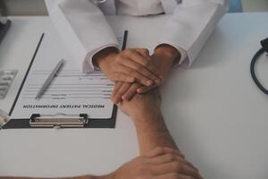 Homecare nursing service and elderly people cardiology healthcare. Close up of young hispanic female doctor nurse check mature caucasian man patient heartbeat using stethoscope during visit photo