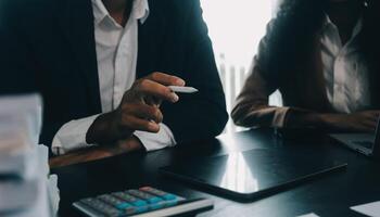 Finance manager meeting discussing company growth project success financial statistics, professional investor working start up project for strategy plan with document, laptop and digital tablet. photo