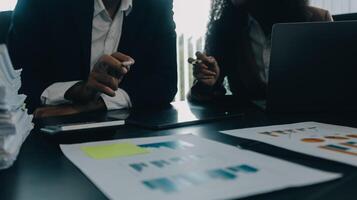 Finance manager meeting discussing company growth project success financial statistics, professional investor working start up project for strategy plan with document, laptop and digital tablet. photo