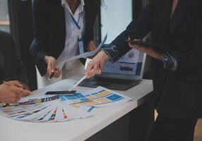 Close up ux developer and ui designer use augmented reality brainstorming about mobile app interface wireframe design on desk at modern office.Creative digital development agency photo