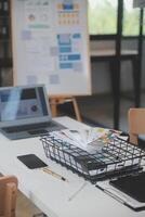 Close up ux developer and ui designer use augmented reality brainstorming about mobile app interface wireframe design on desk at modern office.Creative digital development agency photo