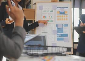 Close up ux developer and ui designer use augmented reality brainstorming about mobile app interface wireframe design on desk at modern office.Creative digital development agency photo