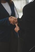 Business handshake for teamwork of business merger and acquisition,successful negotiate,hand shake,two businessman shake hand with partner to celebration partnership and business deal concept photo