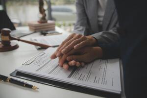 Lawyer, legal advisor, businessman brainstorming information on agreement details Business contracts in legal processing books for accuracy in contract documents. joint financial investment. photo