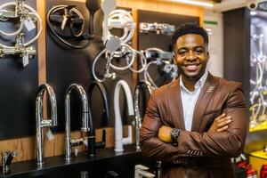 Portrait of salesperson in bathroom store. Happy man works in bath store. Sales occupation. photo