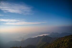 Beautiful sunrise on khao san nok wua kanchanaburi.Khao San Nok Wua is the highest mountain in Khao Laem National Park. It is 1767 meters above sea level. photo