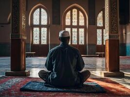 AI generated a backview of muslim man praying in a mosque. Generative AI photo