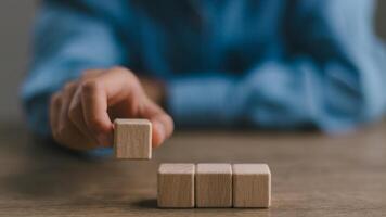 Blank wooden cubes on the table with copy space, empty wooden cubes for input wording, and an infographic icon. photo