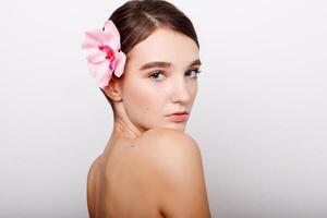 Beautiful Girl With Orchid Flowers photo