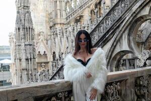 Portrait of a woman in front of the Dome of Milan photo