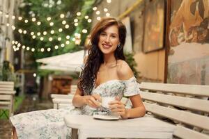 Beautiful lady in a restaurant photo