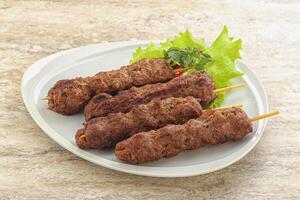 Beef kebab skewer minced meat photo