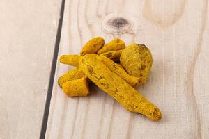 Indian spices - Turmeric root Curcuma photo