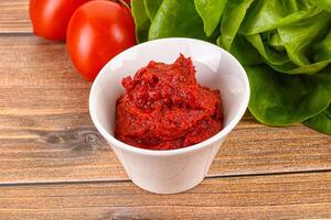 Tomato puree sauce for cooking photo