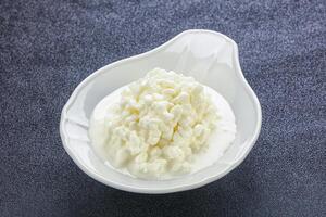 Dietary granulated cottage cheese for breakfast photo