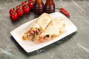 Shawarma with grilled chicken meat photo