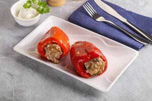 Stuffed bell pepper with minced meat and rice photo