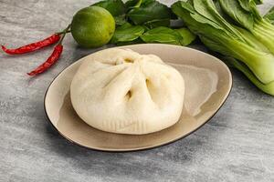 Chinese steamed bun Dim sum photo